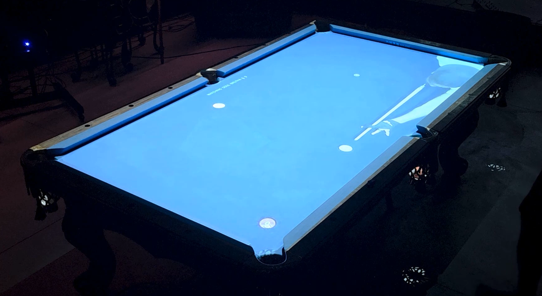An internet opponent projected onto a FusionCue pool table